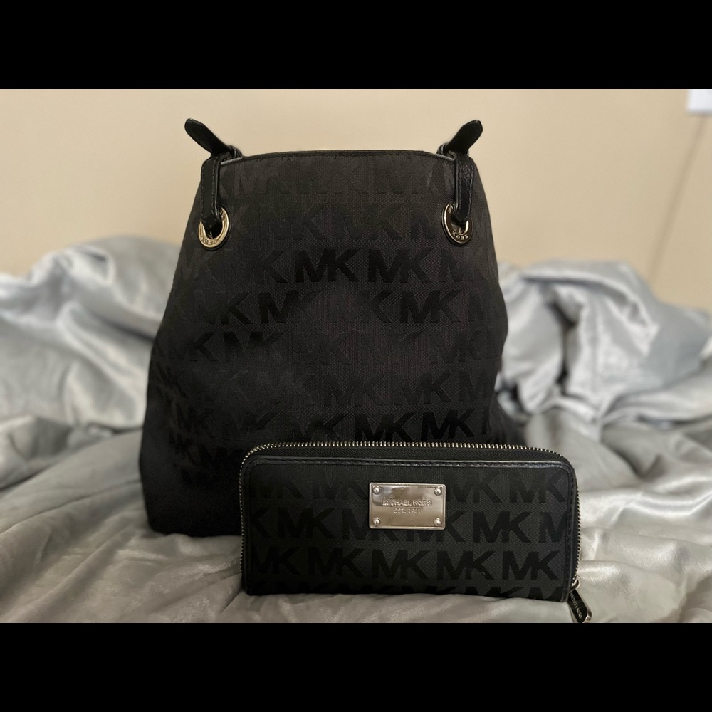 Michael Kors Black purse by & wallet